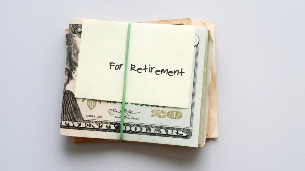 Bundle of savings for retirement, representing retirement savings and long-term financial planning.